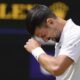 Serbia's Novak Djokovic reacts during his second round match against Britain's Jacob Fearnley at the Wimbledon tennis championships in London, Thursday, July 4, 2024. (AP Photo/Kirsty Wigglesworth)