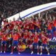 Spain's Alvaro Morata lifts the trophy after winning the final match between Spain and England at the Euro 2024 soccer tournament in Berlin, Germany, Sunday, July 14, 2024. Spain won 2-1. (AP Photo/Manu Fernandez)