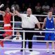 China's Yang Wenlu celebrates after defeating Serbia's Natalia Shadrina in their women's 60 kg quarterfinal boxing match at the 2024 Summer Olympics, Wednesday, July 31, 2024, in Paris, France. (AP Photo/John Locher)