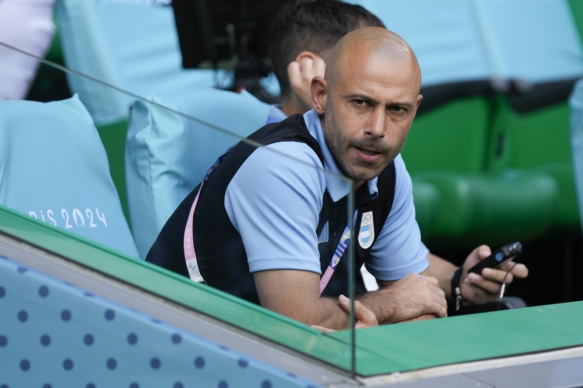 Argentina's coach Javier Mascherano sits on the bench prior to the Men's Group B soccer match between Argentina and Morocco at Geoffroy-Guichard Stadium during the 2024 Summer Olympics, Wednesday, July 24, 2024, in Saint-Etienne, France. (AP Photo/Silvia Izquierdo)