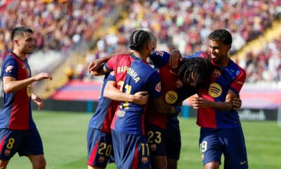 Barcelona's Jules Kounde (23) is congratulated after scoring his side's 3rd goal during the Spanish La Liga soccer match between FC Barcelona and Valladolid at the Olympic stadium in Barcelona, Spain, Saturday, Aug. 31, 2024. (AP Photo/Joan Monfort)