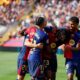 Barcelona's Jules Kounde (23) is congratulated after scoring his side's 3rd goal during the Spanish La Liga soccer match between FC Barcelona and Valladolid at the Olympic stadium in Barcelona, Spain, Saturday, Aug. 31, 2024. (AP Photo/Joan Monfort)