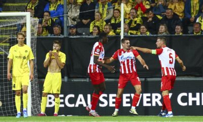 Belgrade's Ognjen Mimovic celebrates after scoring his side's first goal during the Champions League first leg play-off match between Bodø/Glimt and Crvena Zvezda (Red Star Belgrade) at the Aspmyra stadium in Bodø, Norway, Tuesday, Aug. 20, 2024. (Mats Torbergsen/NTB Scanpix via AP)