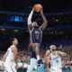 United States' LeBron James, center, goes up for a dunk as Puerto Rico's Tremont Waters, left, and Puerto Rico's Jose Alvarado defend during a men's basketball game at the 2024 Summer Olympics, Saturday, Aug. 3, 2024, in Villeneuve-d'Ascq, France. (AP Photo/Michael Conroy)