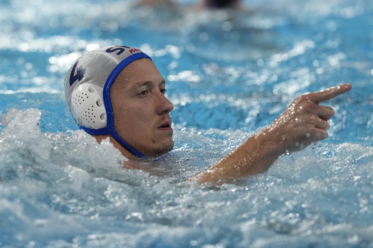 Serbia's Sava Randelovic celebrates after scoring a goal during a men's water polo Group B preliminary match between Serbia and France, at the 2024 Summer Olympics, Saturday, Aug. 3, 2024, in Saint-Denis, France. (AP Photo/Luca Bruno)