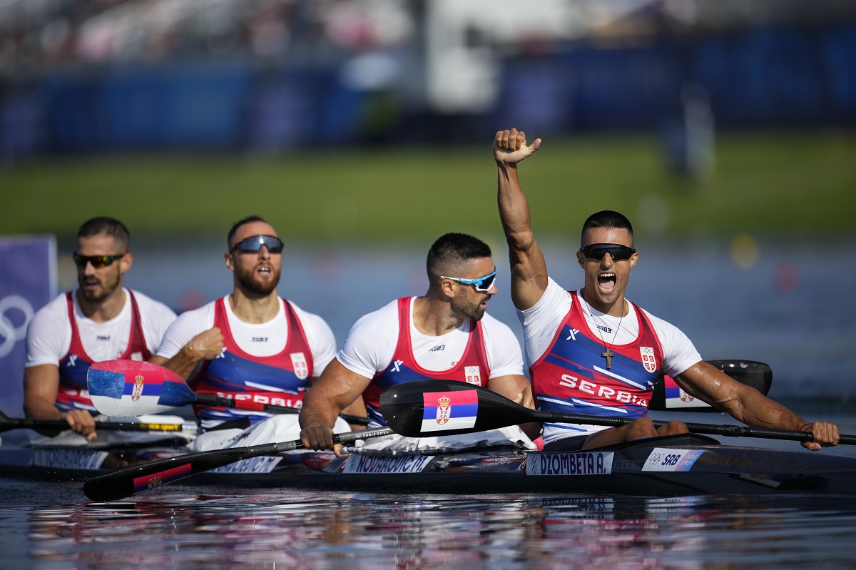 Serbia's Marko Dragosavljevic, Andjelo Dzombeta, Marko Novakovic and Vladimir Torubarov react after competing in the men's kayak four 500-meter heats at the 2024 Summer Olympics, Tuesday, Aug. 6, 2024, in Vaires-sur-Marne, France. (AP Photo/Ebrahim Noroozi)