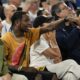 Travis Scott watches the France vs' Germany game during a men's semifinals basketball game at Bercy Arena at the 2024 Summer Olympics, Thursday, Aug. 8, 2024, in Paris, France. (AP Photo/Mark J. Terrill)