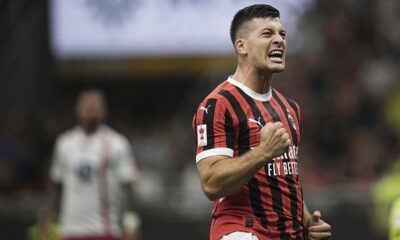 AC Milan's Luka Jović celebrates after the second their goal against Monza during the Silvio Berlusconi Trophy (Trofeo Berlusconi) soccer match at the San Siro Stadium in Milan, Italy, Tuesday, Aug. 13, 2024. (Marco Alpozzi/LaPresse via AP)