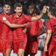 Bayern Munich's Thomas Müller, second from left, celebrates after scoring a goal during a DFB Cup first round soccer match against Ulm, Friday, Aug. 16, 2024, in Ulm, Germany. (Tom Weller/dpa via AP)