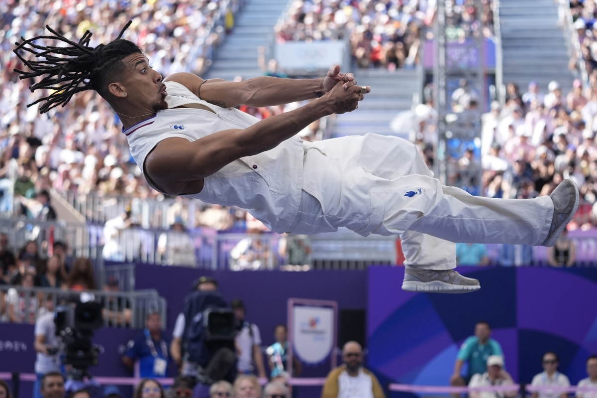 France's Gaetan Alin, known as B-Boy Lagaet competes during the B-Boys round robin battle for the breaking competition at La Concorde Urban Park at the 2024 Summer Olympics, Saturday, Aug. 10, 2024, in Paris, France. (AP Photo/Frank Franklin II)