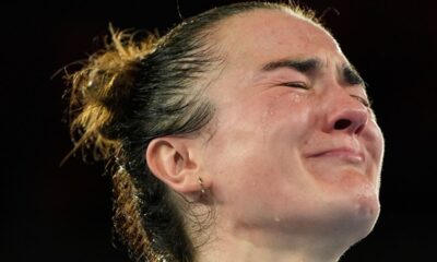 Gold medalist Ireland's Kellie Harrington reacts during the medals ceremony for the women's 60 kg final boxing at the 2024 Summer Olympics, Wednesday, Aug. 7, 2024, in Paris, France. (AP Photo/John Locher)