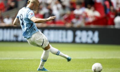 Manchester City forward Erling Haaland kicks a penalty during the FA Community Shield soccer match between Manchester City and Manchester United at Wembley Stadium in London, Saturday, Aug. 10, 2024. (AP Photo/David Cliff)