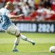 Manchester City forward Erling Haaland kicks a penalty during the FA Community Shield soccer match between Manchester City and Manchester United at Wembley Stadium in London, Saturday, Aug. 10, 2024. (AP Photo/David Cliff)