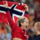 Norway goalkeeper Katrine Lunde, left, celebrates victory after the gold medal handball match between Norway and France at the 2024 Summer Olympics, Saturday, Aug. 10, 2024, in Villeneuve-d'Ascq, France. (AP Photo/Aaron Favila)