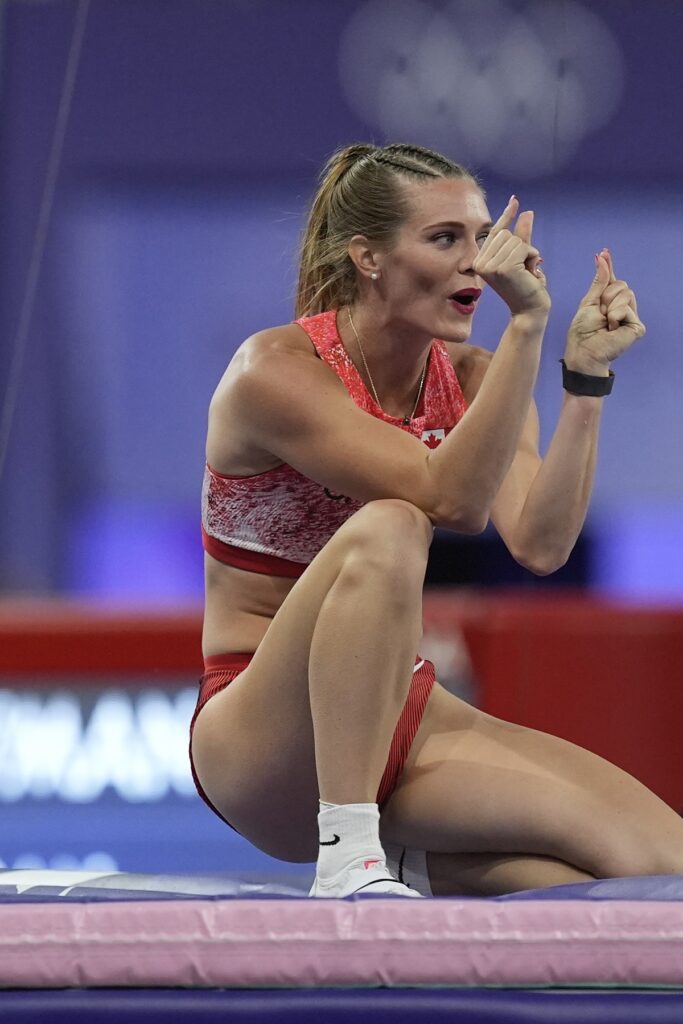 Alysha Newman, of Canada, reacts after a vault in the women's pole vault final at the 2024 Summer Olympics, Wednesday, Aug. 7, 2024, in Saint-Denis, France. (AP Photo/Rebecca Blackwell)