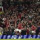 Manchester United's Joshua Zirkzee celebrates after scoring the opening goal during the English Premier League soccer match between Manchester United and Fulham at Old Trafford, Friday, Aug. 16, 2024, in Manchester, England. (AP Photo/Dave Thompson)