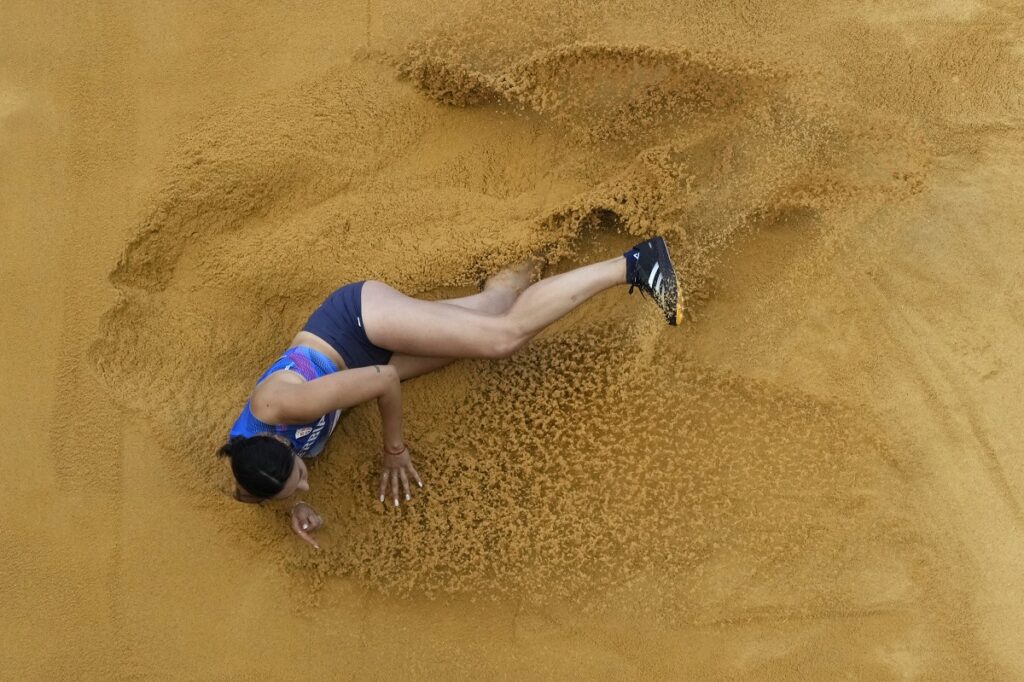 Milica Gardasevic, of Serbia,  competes in the women's long jump qualificaton at the 2024 Summer Olympics, Tuesday, Aug. 6, 2024, in Saint-Denis, France. (AP Photo/David J. Phillip)