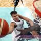 Serbia's Bogdan Bogdanovic, left, shoots as South Sudan's Majok Deng defends during a men's basketball game at the 2024 Summer Olympics, Saturday, Aug. 3, 2024, in Villeneuve-d'Ascq, France. (Gregory Shamus/Pool Photo via AP)