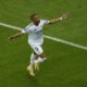 Real Madrid's Kylian Mbappe celebrates after scoring his side's second goal during the UEFA Super Cup Final soccer match between Real Madrid and Atalanta at the Narodowy stadium in Warsaw, Poland, Wednesday, Aug. 14, 2024. (AP Photo/Darko Vojinovic)