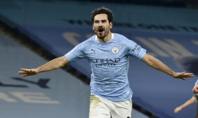 FILE - Manchester City's Ilkay Gundogan celebrates after scoring his side's third goal during the English Premier League soccer match between Manchester City and Tottenham Hotspur at Etihad Stadium, Manchester, England, on Feb. 13, 2021. Ilkay Gundogan is back at Manchester City for a sequel few could have expected. (AP photo/Rui Vieira, Pool File)