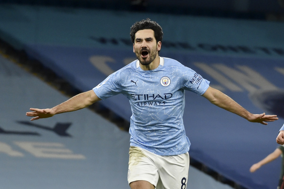 FILE - Manchester City's Ilkay Gundogan celebrates after scoring his side's third goal during the English Premier League soccer match between Manchester City and Tottenham Hotspur at Etihad Stadium, Manchester, England, on Feb. 13, 2021. Ilkay Gundogan is back at Manchester City for a sequel few could have expected. (AP photo/Rui Vieira, Pool File)