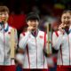 China athletes with the gold medals pose during the medal ceremony of the women's team table tennis match at the 2024 Summer Olympics, Saturday, Aug. 10, 2024, in Paris, France. (AP Photo/Petros Giannakouris)