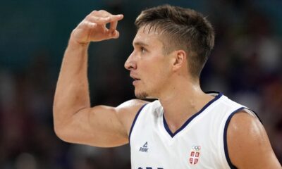 Serbia's Bogdan Bogdanovic celebrates after hitting a three-point shot during a men's basketball game against South Sudan at the 2024 Summer Olympics, Saturday, Aug. 3, 2024, in Villeneuve-d'Ascq, France. (AP Photo/Michael Conroy)