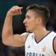 Serbia's Bogdan Bogdanovic celebrates after hitting a three-point shot during a men's basketball game against South Sudan at the 2024 Summer Olympics, Saturday, Aug. 3, 2024, in Villeneuve-d'Ascq, France. (AP Photo/Michael Conroy)