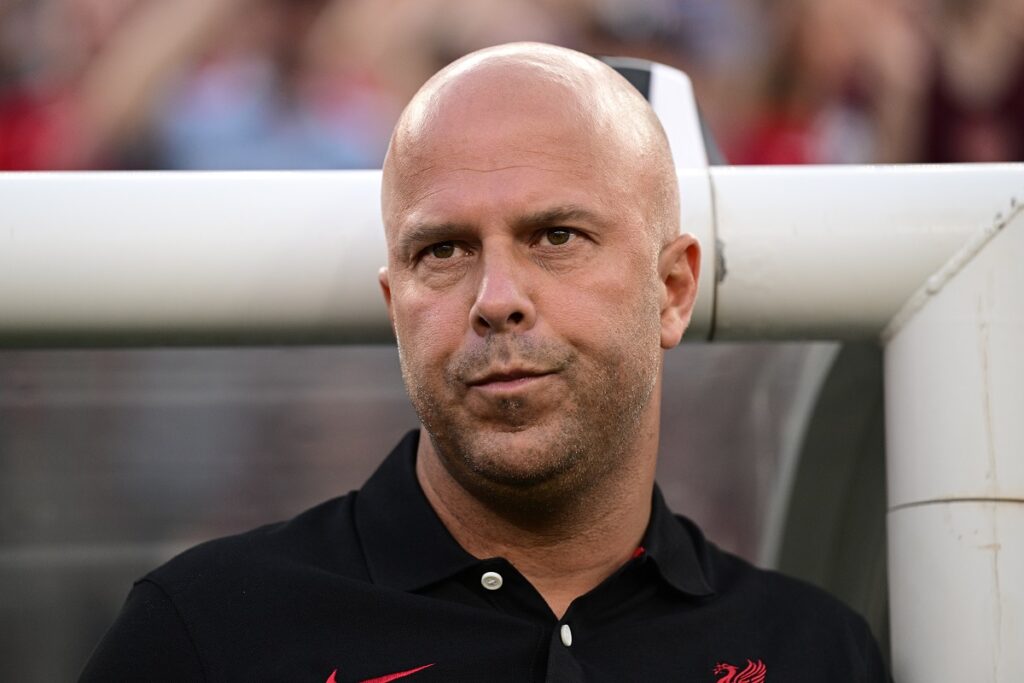 FILE - Liverpool manager Arne Slot looks on from the sidelines prior to an international friendly soccer match against Arsenal, on July 31, 2024, in Philadelphia. A quarter of the coaches will be taking charge of a Premier League game for the first time, with Liverpool (Arne Slot), Chelsea (Enzo Maresca) and Brighton (Fabian Hurzeler) all having new managers and both Southampton (Russell Martin) and Ipswich (Kieran McKenna) gaining promotion with managers owning no top-flight experience. (AP Photo/Derik Hamilton, File)