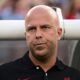 FILE - Liverpool manager Arne Slot looks on from the sidelines prior to an international friendly soccer match against Arsenal, on July 31, 2024, in Philadelphia. A quarter of the coaches will be taking charge of a Premier League game for the first time, with Liverpool (Arne Slot), Chelsea (Enzo Maresca) and Brighton (Fabian Hurzeler) all having new managers and both Southampton (Russell Martin) and Ipswich (Kieran McKenna) gaining promotion with managers owning no top-flight experience. (AP Photo/Derik Hamilton, File)