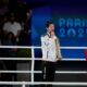 Gold medalist Taiwan's Lin Yu-ting, center, kisses her medal during a ceremony for the women's 57 kg final boxing match at the 2024 Summer Olympics, Saturday, Aug. 10, 2024, in Paris, France. (AP Photo/Ariana Cubillos)