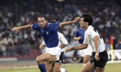 FILE - Italy's Salvatore "Totò" Schillaci, left, and Argentina's Juan Simon chase the ball during the Soccer World Cup semi-final, in Naples, Italy, July 3, 1990. (AP Photo, file)