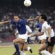 FILE - Italy's Salvatore "Totò" Schillaci, left, and Argentina's Juan Simon chase the ball during the Soccer World Cup semi-final, in Naples, Italy, July 3, 1990. (AP Photo, file)