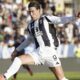 Juventus Dusan Vlahovic, top, is tackled by Empoli's Ardian Ismajli during the Italian Serie A soccer match between Empoli and Juventus at the Carlo Castellani Stadium in Empoli, Italy, Saturday, Sept. 14, 2024. (Marco Bucco/LaPresse via AP)