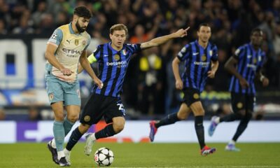 Manchester City's Josko Gvardiol, left, is challenged by Inter Milan's Nicolo Barella during the Champions League opening phase soccer match between Manchester City and Inter Milan at the Etihad Stadium, in Manchester, England, Wednesday, Sept. 18, 2024. (AP Photo/Dave Thompson)