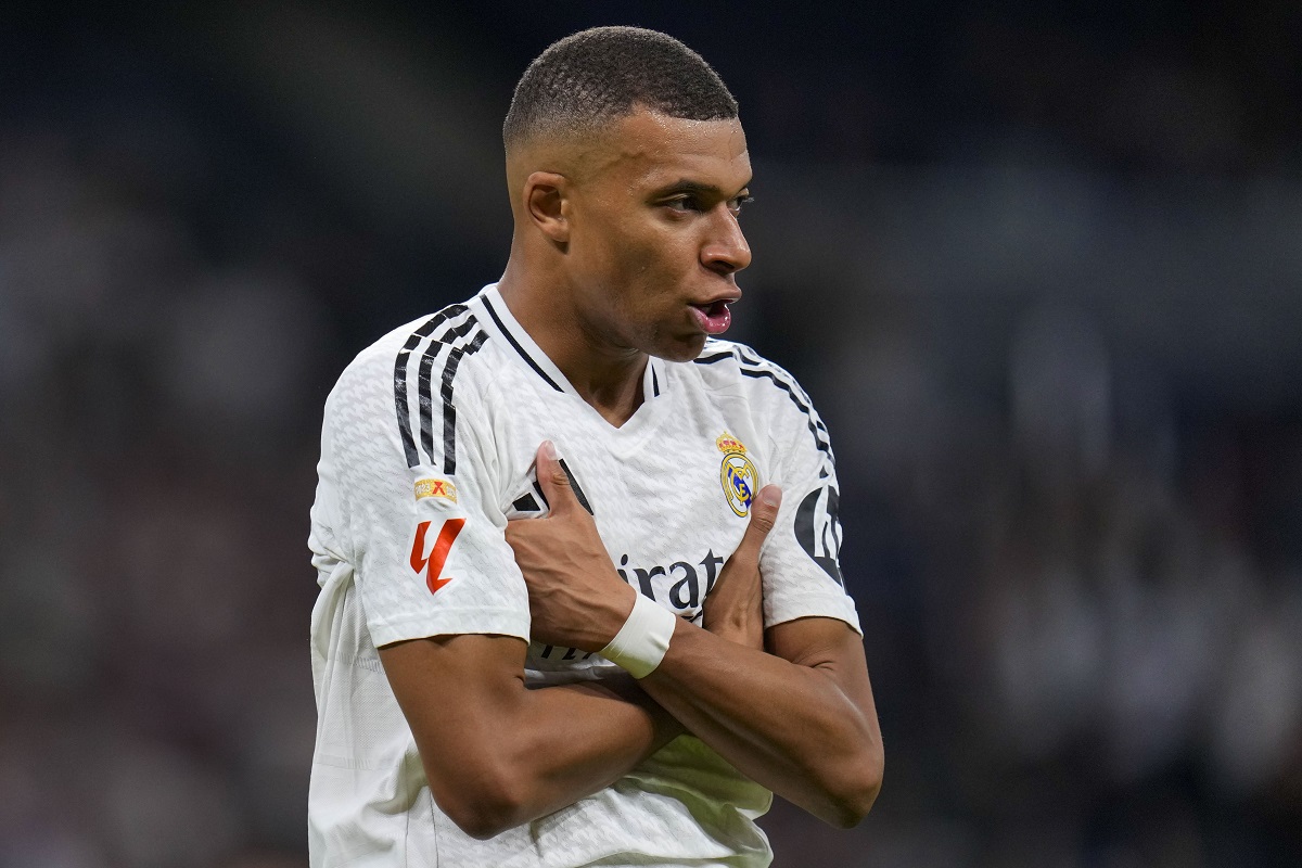 Real Madrid's Kylian Mbappe celebrates after scoring his side's second goal during a Spanish La Liga soccer match between Real Madrid and Alaves at Santiago Bernabeu stadium in Madrid, Spain, Tuesday, Sept. 24, 2024. (AP Photo/Manu Fernandez)