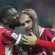 Milan's Alvaro Morata, right, celebrates after scoring the opening goal during the Serie A soccer match between AC Milan and Lecce at the San Siro stadium in Milan, Italy, Friday, Sept. 27, 2024. (Spada/LaPresse via AP)