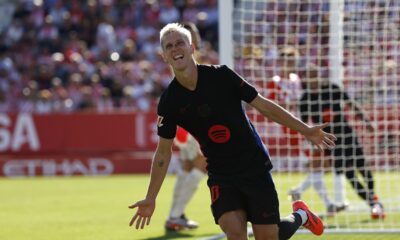 Barcelona's Dani Olmo celebrates after scoring his side's third goal during the Spanish La Liga soccer match between Girona and Barcelona at the Montilivi stadium in Girona, Spain, Sunday, Sept. 15, 2024. (AP Photo/Joan Monfort)