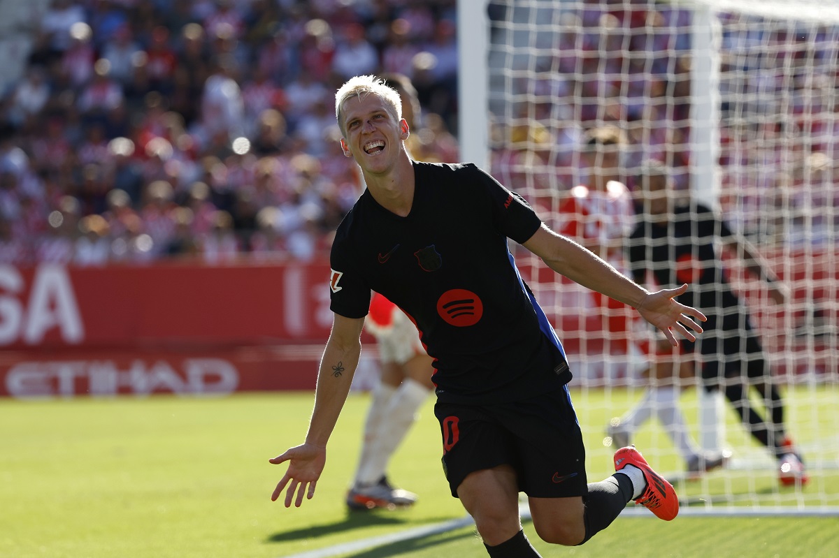 Barcelona's Dani Olmo celebrates after scoring his side's third goal during the Spanish La Liga soccer match between Girona and Barcelona at the Montilivi stadium in Girona, Spain, Sunday, Sept. 15, 2024. (AP Photo/Joan Monfort)