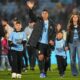 Uruguay's Luis Suarez waves to fans, accompanied by his children, after a qualifying soccer match for the FIFA World Cup 2026 against Paraguay, in Montevideo, Uruguay, Friday, Sept. 6, 2024. Suarez played his last game for Uruguay ending a 17 years international carrer. (AP Photo/Matilde Campodonico)