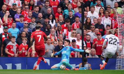 Liverpool's Luis Diaz scores his side's second goal of the game, during the English Premier League soccer match between Liverpool and Bournemouth, at Anfield, in Liverpool, England, Saturday, Sept. 21, 2024. (Peter Byrne/PA via AP)