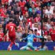 Liverpool's Luis Diaz scores his side's second goal of the game, during the English Premier League soccer match between Liverpool and Bournemouth, at Anfield, in Liverpool, England, Saturday, Sept. 21, 2024. (Peter Byrne/PA via AP)