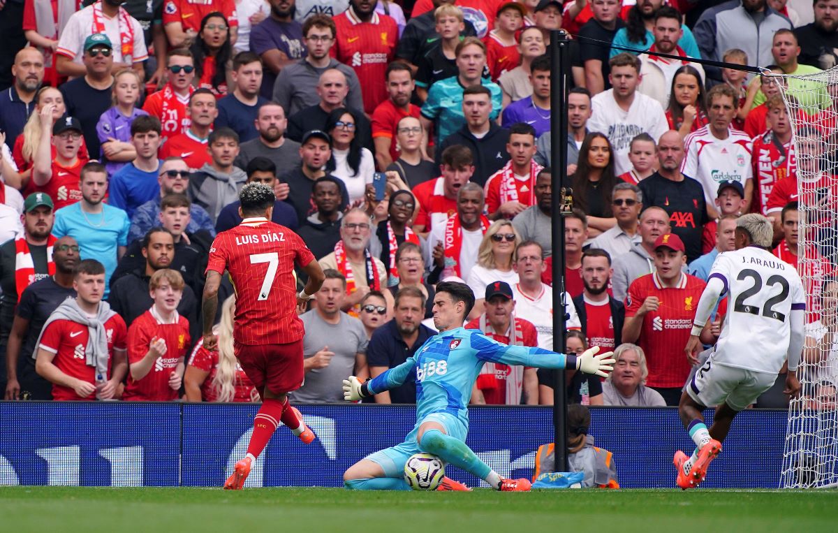 Liverpool's Luis Diaz scores his side's second goal of the game, during the English Premier League soccer match between Liverpool and Bournemouth, at Anfield, in Liverpool, England, Saturday, Sept. 21, 2024. (Peter Byrne/PA via AP)