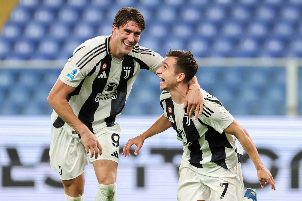 Juventus' Francisco Conceicao, right, celebrates after scoring his side's third goal during the Serie A soccer match between Genoa and Juventus at the Luigi Ferraris Stadium in Genoa, Italy, Sunday, Sept. 28, 2024. (Tano Pecoraro/LaPresse via AP)