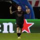 Benfica's Kerem Akturkoglu celebrates after scoring the opening goal of his team during the Champions League opening phase soccer match between Red Star and SL Benfica, at the Rajko Mitic Stadium in Belgrade, Serbia, Thursday, Sept. 19, 2024. (AP Photo/Darko Vojinovic)