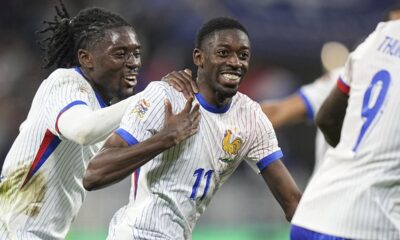 France's Ousmane Dembele, right, celebrates with teammates after scoring his side's second goal during the UEFA Nations League soccer match between France and Belgium at the Groupama stadium in Decines, outside Lyon, France, Monday, Sept. 9, 2024. (AP Photo/Laurent Cipriani)