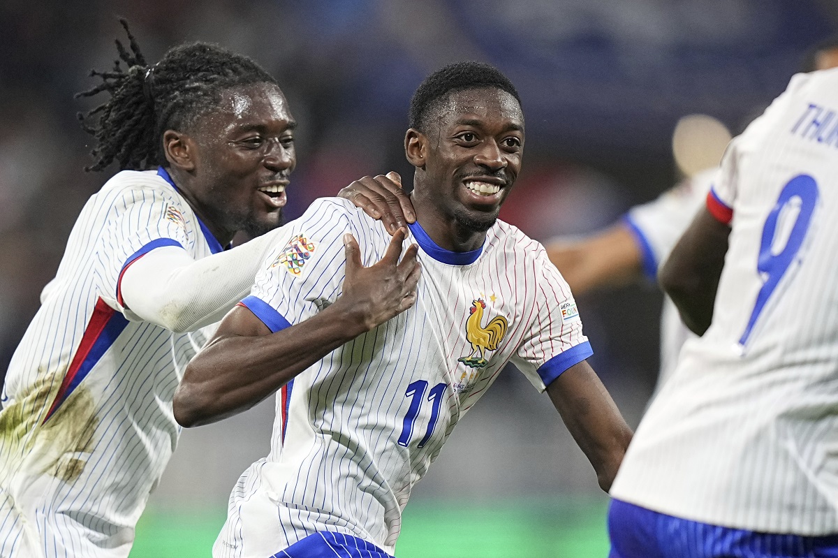 France's Ousmane Dembele, right, celebrates with teammates after scoring his side's second goal during the UEFA Nations League soccer match between France and Belgium at the Groupama stadium in Decines, outside Lyon, France, Monday, Sept. 9, 2024. (AP Photo/Laurent Cipriani)