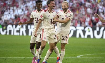 Bayern's Thomas Mueller, center, celebrates with teammates after scoring his side's second goal during the Bundesliga soccer match between Bayern Munich and SC Freiburg at the Allianz Arena in Munich, Germany, Sunday, Sept. 1, 2024. (AP Photo/Matthias Schrader)