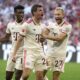 Bayern's Thomas Mueller, center, celebrates with teammates after scoring his side's second goal during the Bundesliga soccer match between Bayern Munich and SC Freiburg at the Allianz Arena in Munich, Germany, Sunday, Sept. 1, 2024. (AP Photo/Matthias Schrader)