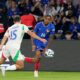 France's Bradley Barcola, right, vies for the ball with Italy's Andrea Cambiasso during the UEFA Nations League soccer match between France and Italy at the Parc des Princes in Paris, Friday, Sept. 6, 2024. (AP Photo/Michel Euler)